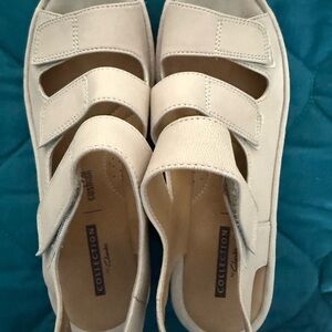 Clarks Cream Sandals Minimalist Slip-On Design